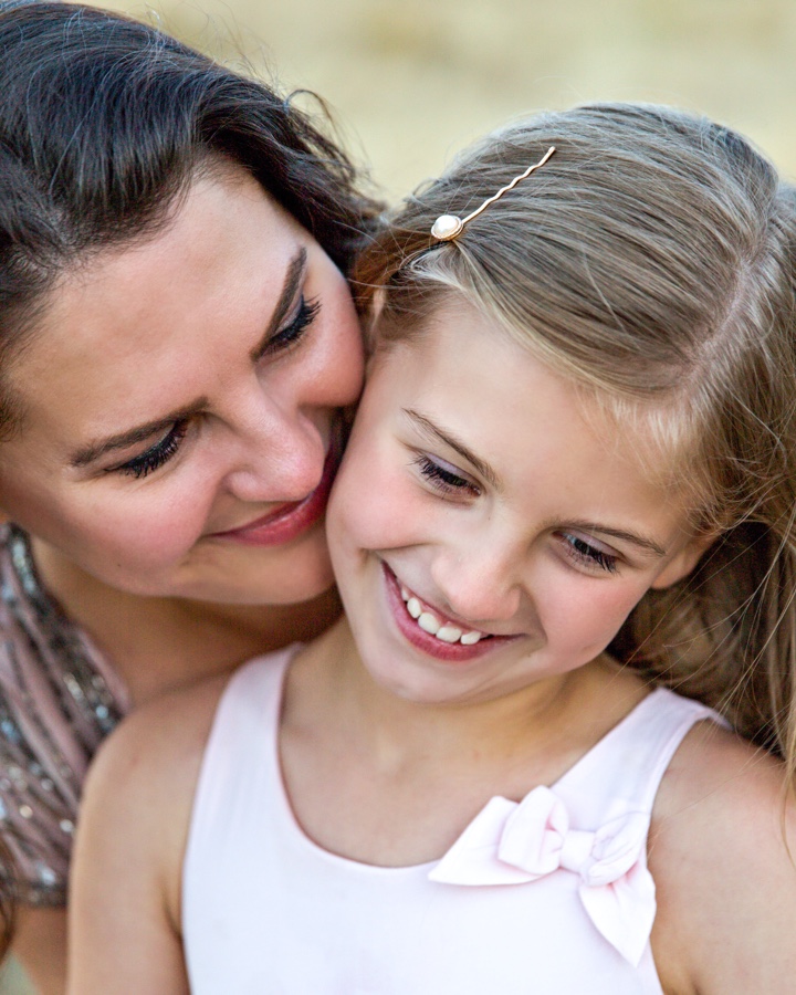 Mother and daughter smiling after working with family legal services by Maguire Family Law.